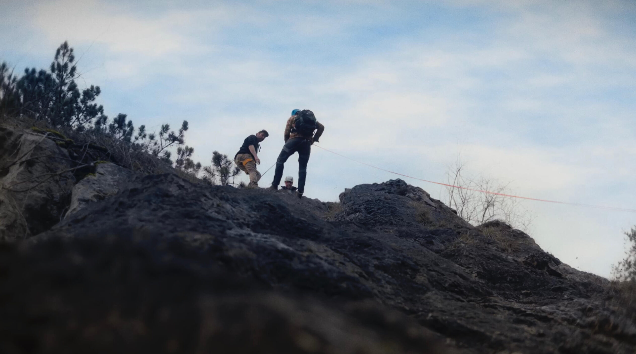 Abseiling climbing down